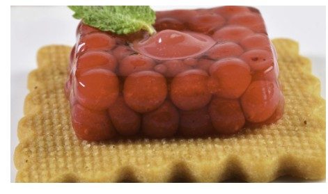 Spherified fruit on a sablé base